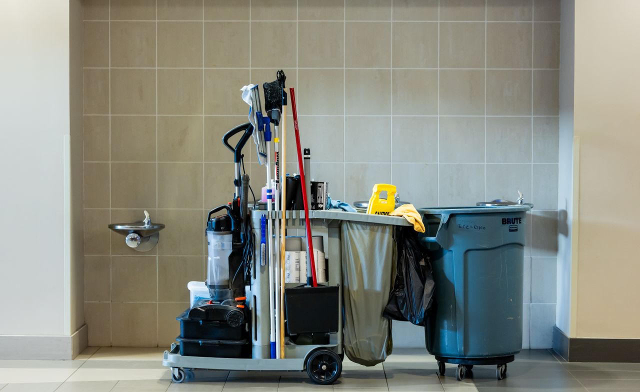 The Art of Drawing Readers In: Your attractive post title goes here A comprehensive collection of professional cleaning tools on a cart in an indoor environment.